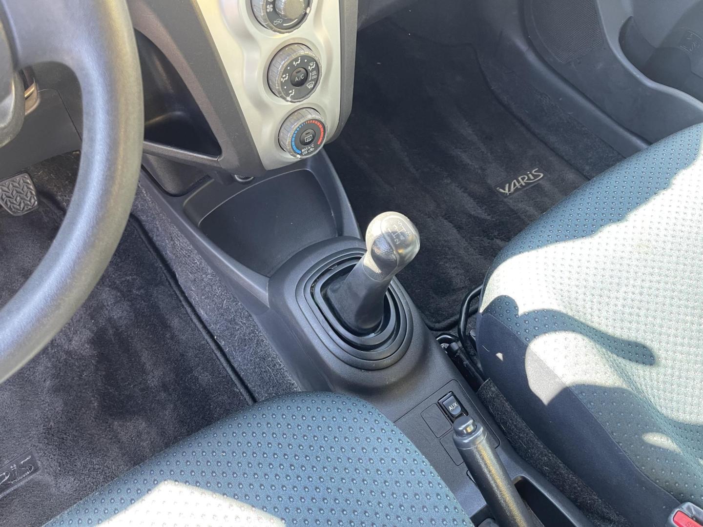2008 Blue /Tan Toyota Yaris Liftback (JTDJT923785) with an 1.5L L4 DOHC 16V engine, Manual transmission, located at 801 South State Street, Salt Lake City, UT, 84111, (801) 328-0098, 40.751953, -111.888206 - Clean 1 owner! Clean title! Great gas mileage gets over 35-40 MPG with a manual transmission and 1.5 liter 4 cylinder! Perfect commuter car for anyone who drives to work over 20-50 miles! This is a perfect car to travel on long distance trips to save gas money! Features: Cloth Seats, AM/FM Stereo, - Photo#21