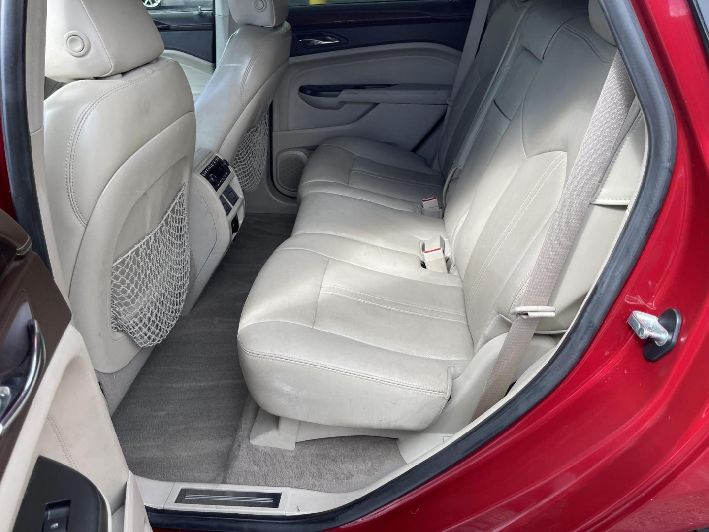 2012 /Tan Cadillac SRX Premium (3GYFNCE3XCS) with an 3.6L V6 DOHC 24V FFV engine, 6-Speed Automatic transmission, located at 801 South State Street, Salt Lake City, UT, 84111, (801) 328-0098, 40.751953, -111.888206 - Wow extra clean beautiful SUV inside and out! Clean Title! This is a must see only 2 owners on the Carfax history report. From dry climate area no salt, no rust and very clean! Features: 20 Inch Plus Wheels, Navigation System, A/C Seat(s), Panoramic Sunroof, Alloy Wheels, Parking Sensors, BOSE Soun - Photo#10
