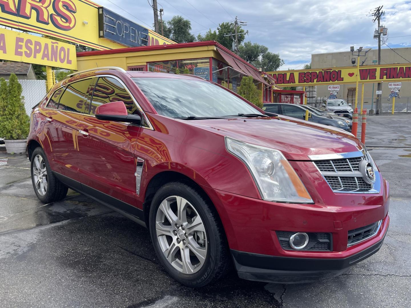 2012 /Tan Cadillac SRX Premium (3GYFNCE3XCS) with an 3.6L V6 DOHC 24V FFV engine, 6-Speed Automatic transmission, located at 801 South State Street, Salt Lake City, UT, 84111, (801) 328-0098, 40.751953, -111.888206 - Wow extra clean beautiful SUV inside and out! Clean Title! This is a must see only 2 owners on the Carfax history report. From dry climate area no salt, no rust and very clean! Features: 20 Inch Plus Wheels, Navigation System, A/C Seat(s), Panoramic Sunroof, Alloy Wheels, Parking Sensors, BOSE Soun - Photo#3