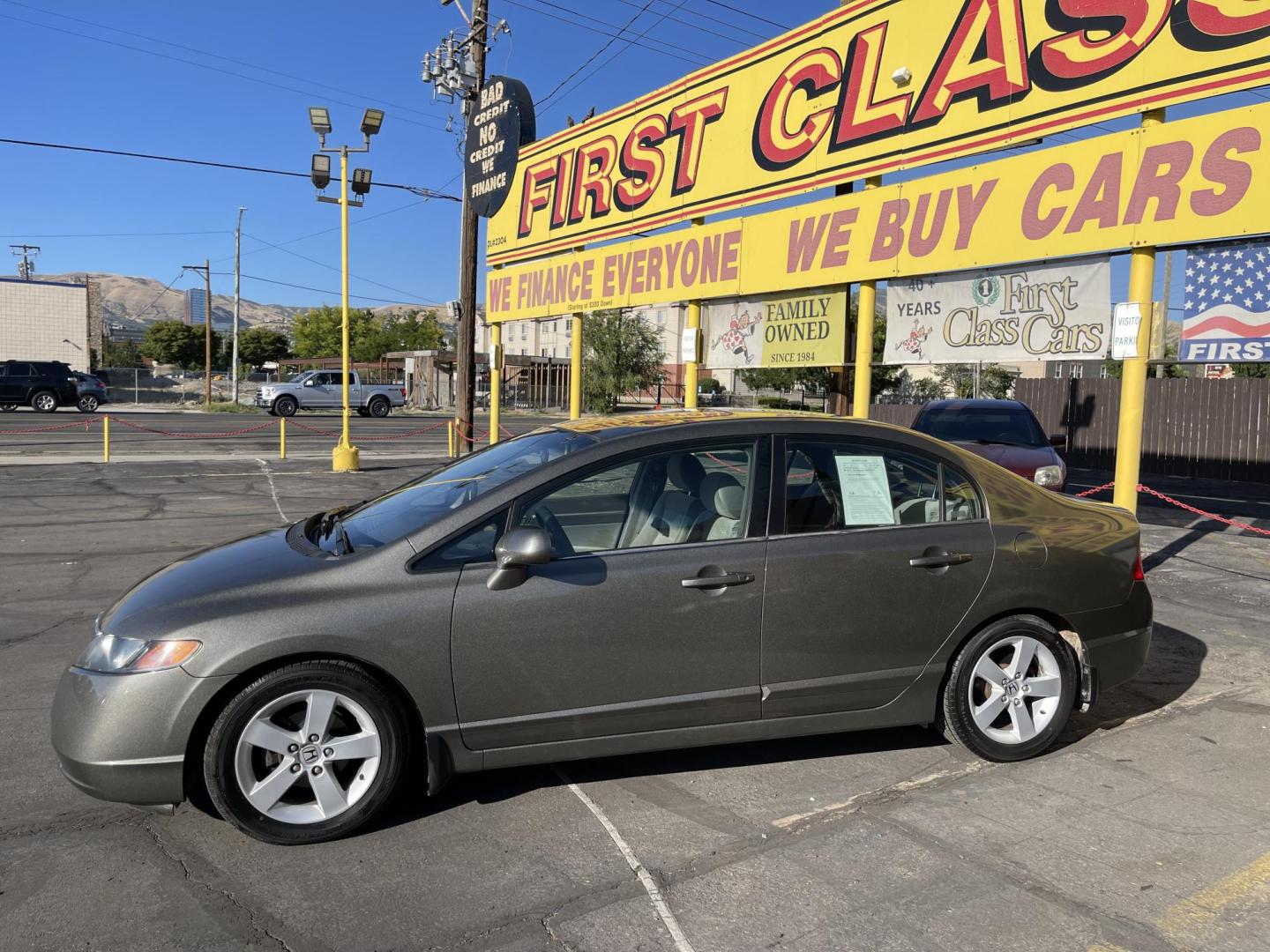 2006 Mineral Gray Metallic /Gray Honda Civic EX Sedan (1HGFA15826L) with an 1.8L L4 SOHC 16V engine, 5-Speed Manual transmission, located at 801 South State Street, Salt Lake City, UT, 84111, (801) 328-0098, 40.751953, -111.888206 - Clean title! Clean Carfax no rebuilt restored, dry climate car hasn't been in the Utah snow yet! Great on gas with a manual transmission 4 cylinder you will get well over 35 MPG!!! Great commuter car to and from work!!! Features: Alloy Wheels, Cloth Seats, Satellite Radio Ready, Sunroof(s), ABS B - Photo#28