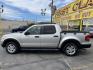2008 Silver Sky Metallic /Tan Ford Explorer Sport Trac XLT 4.0L 2WD (1FMEU31E58U) with an 4.0L V6 SOHC 12V engine, 5-Speed Automatic transmission, located at 801 South State Street, Salt Lake City, UT, 84111, (801) 328-0098, 40.751953, -111.888206 - Super clean hard to find! Clean Carfax no reported accidents clean title! Lots of regular service history shown on Carfax vehicle has been maintained and taken care of. Features: Alloy Wheels, Satellite Radio Ready, Cloth Seats, Tow Hitch, Running Boards, ABS Brakes, CD Audio, Power Locks, Tractio - Photo#8
