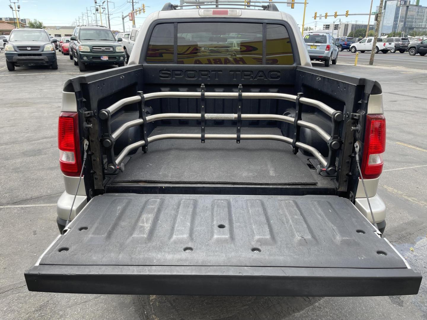 2008 Silver Sky Metallic /Tan Ford Explorer Sport Trac XLT 4.0L 2WD (1FMEU31E58U) with an 4.0L V6 SOHC 12V engine, 5-Speed Automatic transmission, located at 801 South State Street, Salt Lake City, UT, 84111, (801) 328-0098, 40.751953, -111.888206 - Super clean hard to find! Clean Carfax no reported accidents clean title! Lots of regular service history shown on Carfax vehicle has been maintained and taken care of. Features: Alloy Wheels, Satellite Radio Ready, Cloth Seats, Tow Hitch, Running Boards, ABS Brakes, CD Audio, Power Locks, Tractio - Photo#23