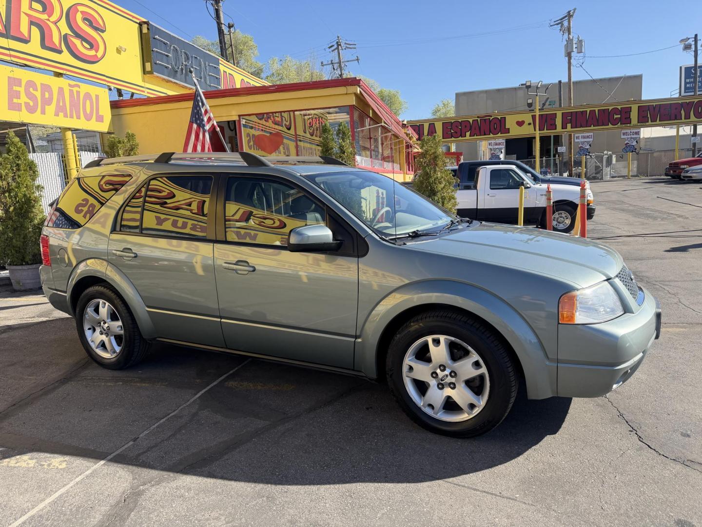 2005 Evergreen Frost Metallic /Tan Ford Freestyle Limited AWD (1FMDK06105G) with an 3.0L V6 DOHC 24V engine, Automatic CVT Overdrive transmission, located at 801 South State Street, Salt Lake City, UT, 84111, (801) 328-0098, 40.751953, -111.888206 - Clean title no reported accidents on Carfax history report. Very nice in great condition for the year and miles. It is in great shape inside and out! Comes with 3rd row seating! Passed all inspections through a certified mechanic and eligible for up to a 5 year warranty that can be added to the car. - Photo#4
