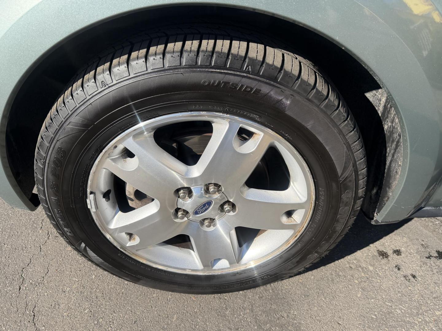 2005 Evergreen Frost Metallic /Tan Ford Freestyle Limited AWD (1FMDK06105G) with an 3.0L V6 DOHC 24V engine, Automatic CVT Overdrive transmission, located at 801 South State Street, Salt Lake City, UT, 84111, (801) 328-0098, 40.751953, -111.888206 - Clean title no reported accidents on Carfax history report. Very nice in great condition for the year and miles. It is in great shape inside and out! Comes with 3rd row seating! Passed all inspections through a certified mechanic and eligible for up to a 5 year warranty that can be added to the car. - Photo#9