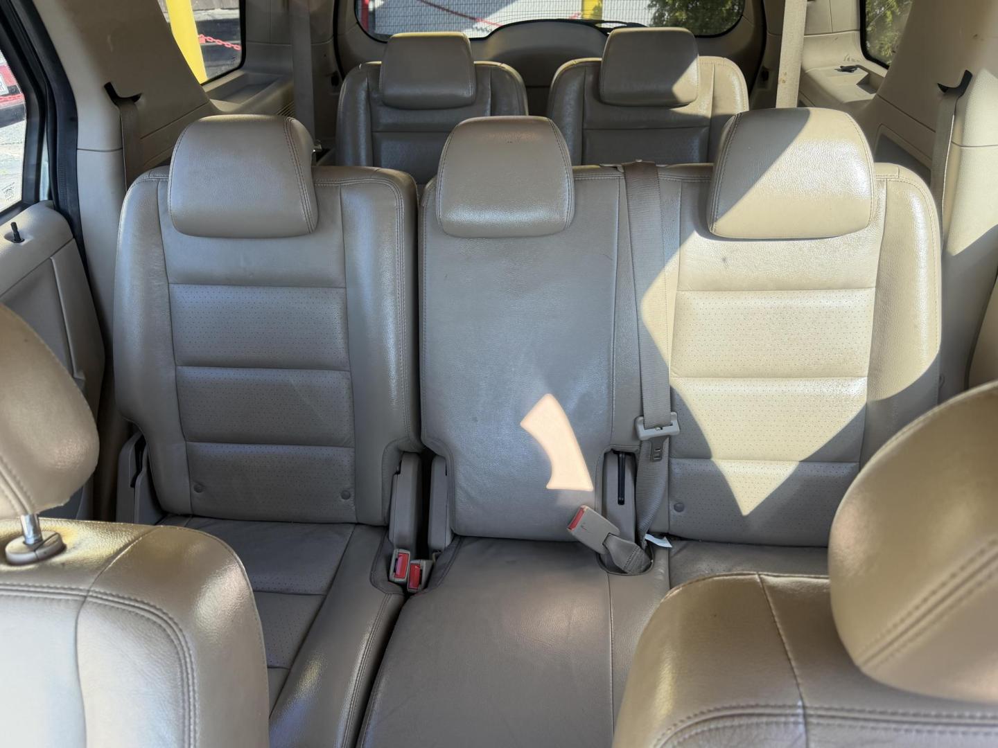 2005 Evergreen Frost Metallic /Tan Ford Freestyle Limited AWD (1FMDK06105G) with an 3.0L V6 DOHC 24V engine, Automatic CVT Overdrive transmission, located at 801 South State Street, Salt Lake City, UT, 84111, (801) 328-0098, 40.751953, -111.888206 - Clean title no reported accidents on Carfax history report. Very nice in great condition for the year and miles. It is in great shape inside and out! Comes with 3rd row seating! Passed all inspections through a certified mechanic and eligible for up to a 5 year warranty that can be added to the car. - Photo#16