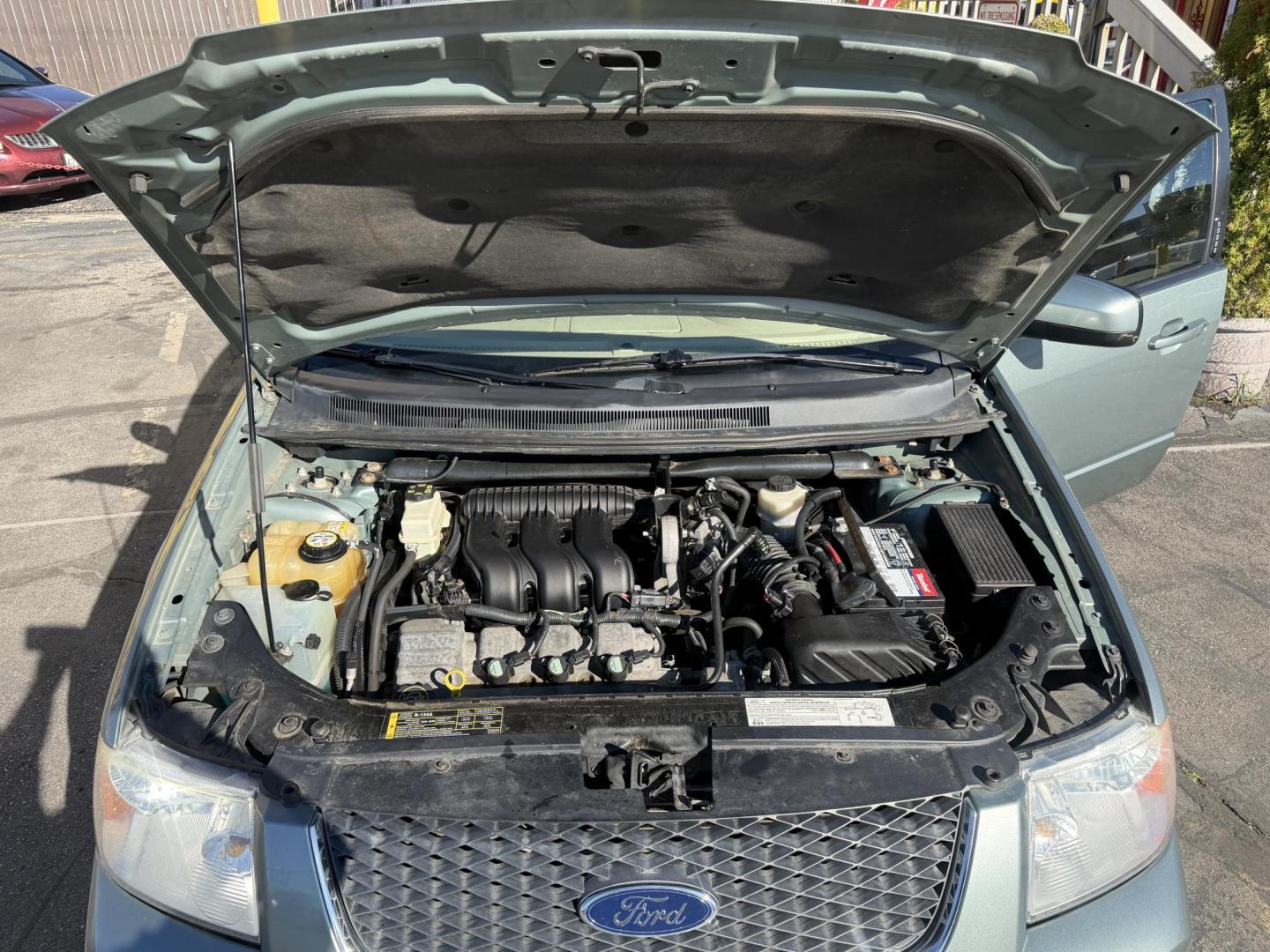 2005 Evergreen Frost Metallic /Tan Ford Freestyle Limited AWD (1FMDK06105G) with an 3.0L V6 DOHC 24V engine, Automatic CVT Overdrive transmission, located at 801 South State Street, Salt Lake City, UT, 84111, (801) 328-0098, 40.751953, -111.888206 - Clean title no reported accidents on Carfax history report. Very nice in great condition for the year and miles. It is in great shape inside and out! Comes with 3rd row seating! Passed all inspections through a certified mechanic and eligible for up to a 5 year warranty that can be added to the car. - Photo#24