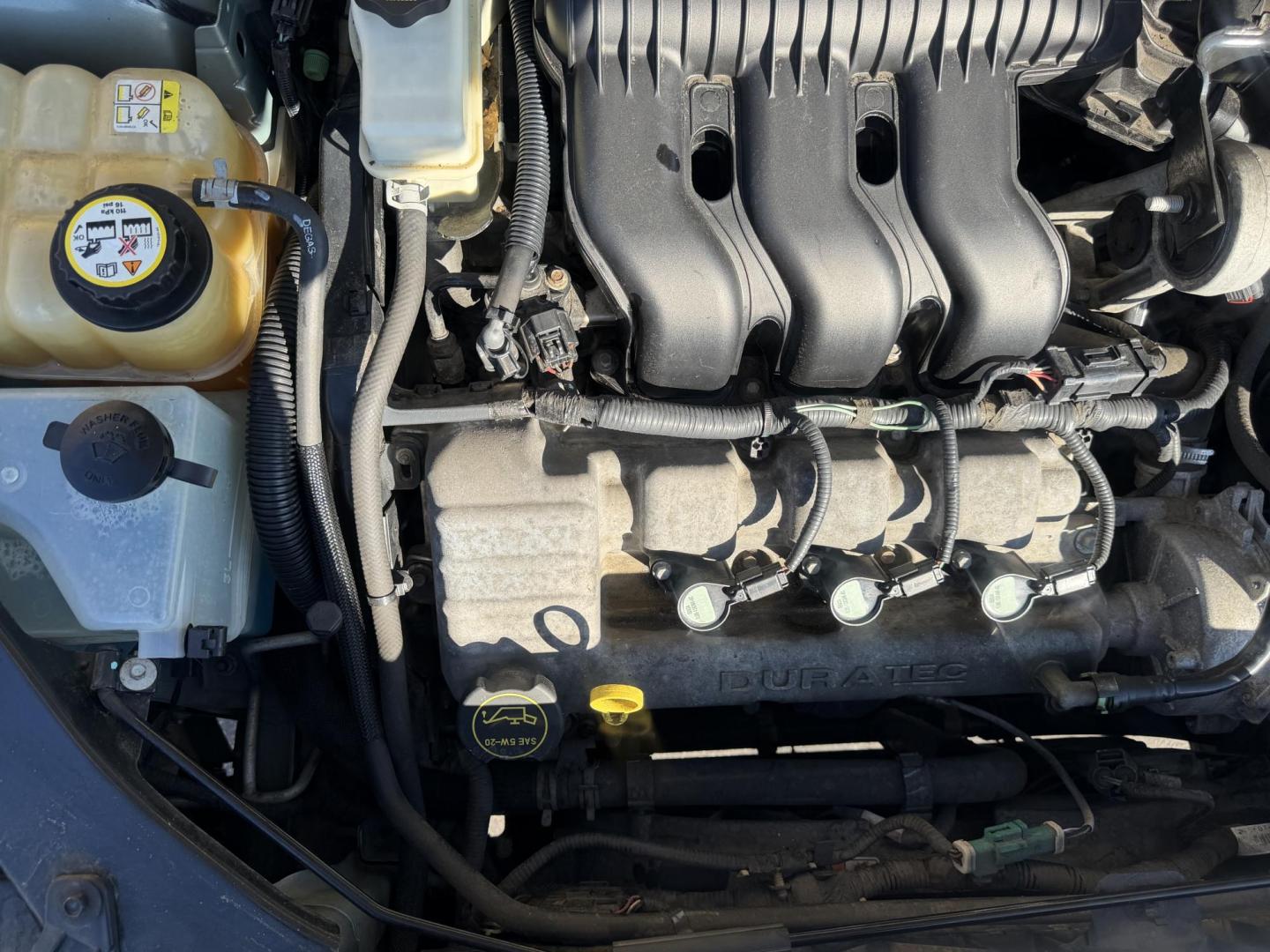 2005 Evergreen Frost Metallic /Tan Ford Freestyle Limited AWD (1FMDK06105G) with an 3.0L V6 DOHC 24V engine, Automatic CVT Overdrive transmission, located at 801 South State Street, Salt Lake City, UT, 84111, (801) 328-0098, 40.751953, -111.888206 - Clean title no reported accidents on Carfax history report. Very nice in great condition for the year and miles. It is in great shape inside and out! Comes with 3rd row seating! Passed all inspections through a certified mechanic and eligible for up to a 5 year warranty that can be added to the car. - Photo#26