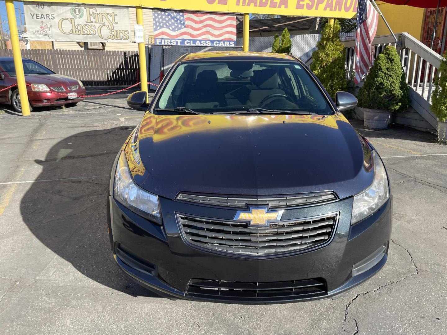 2013 Black Metallic /Black Chevrolet Cruze 1LT Auto (1G1PC5SB5D7) with an 1.4L L4 DOHC 16V TURBO engine, 6-Speed Automatic transmission, located at 801 South State Street, Salt Lake City, UT, 84111, (801) 328-0098, 40.751953, -111.888206 - Clean title! Clean Carfax history report only 2 previous owners!!! Low miles for the year! Vehicle is in good condition inside and out a must see to believe!!! EPA estimated fuel economy stands at 24 mpg city/35 mpg highway and 27 mpg combined great on gas! Features: Alloy Wheels, Satellite Radio R - Photo#2