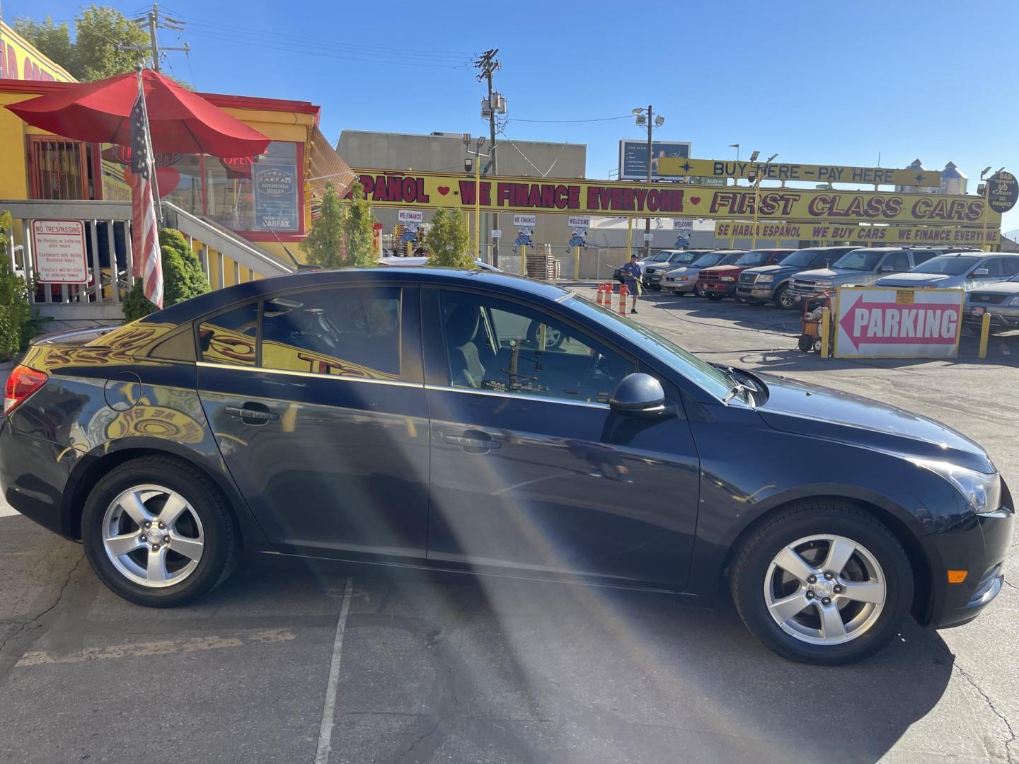 2013 Black Metallic /Black Chevrolet Cruze 1LT Auto (1G1PC5SB5D7) with an 1.4L L4 DOHC 16V TURBO engine, 6-Speed Automatic transmission, located at 801 South State Street, Salt Lake City, UT, 84111, (801) 328-0098, 40.751953, -111.888206 - Clean title! Clean Carfax history report only 2 previous owners!!! Low miles for the year! Vehicle is in good condition inside and out a must see to believe!!! EPA estimated fuel economy stands at 24 mpg city/35 mpg highway and 27 mpg combined great on gas! Features: Alloy Wheels, Satellite Radio R - Photo#4