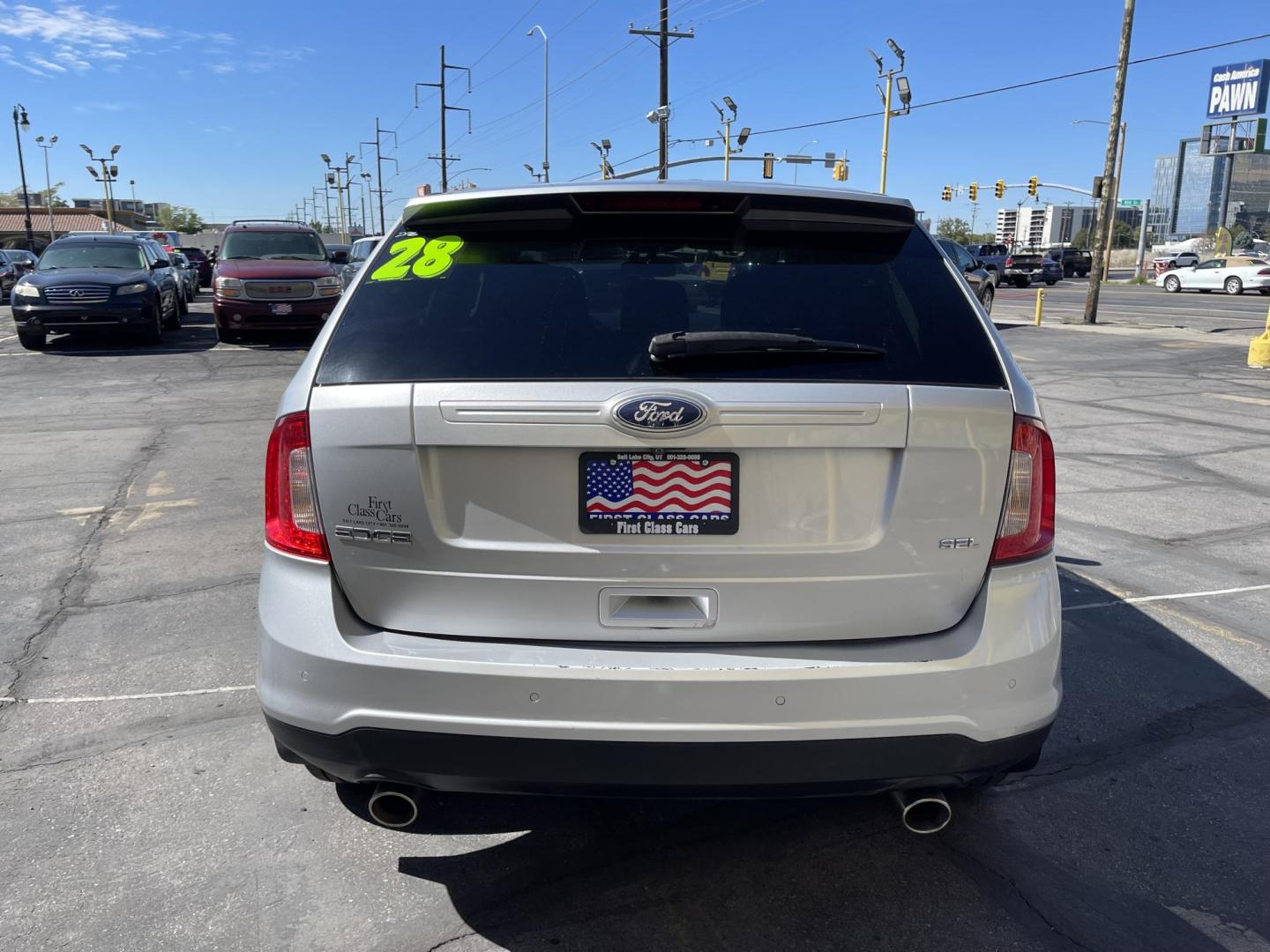 2011 Satin Silver Metallic /Black Ford Edge SEL FWD (2FMDK3JC2BB) with an 3.5L V6 DOHC 24V engine, 6-Speed Automatic transmission, located at 801 South State Street, Salt Lake City, UT, 84111, (801) 328-0098, 40.751953, -111.888206 - Clean Carfax no reported accidents on Carfax! Nice SUV! Features: Alloy Wheels, Parking Sensors, Bluetooth Technology, Satellite Radio Ready, Cloth Seats, SiriusXM Trial Available, ABS Brakes, Auxiliary Audio Input, Power Locks, Rear Defroster, AM/FM Stereo, CD Audio, Power Mirrors, Side Airbags, - Photo#9