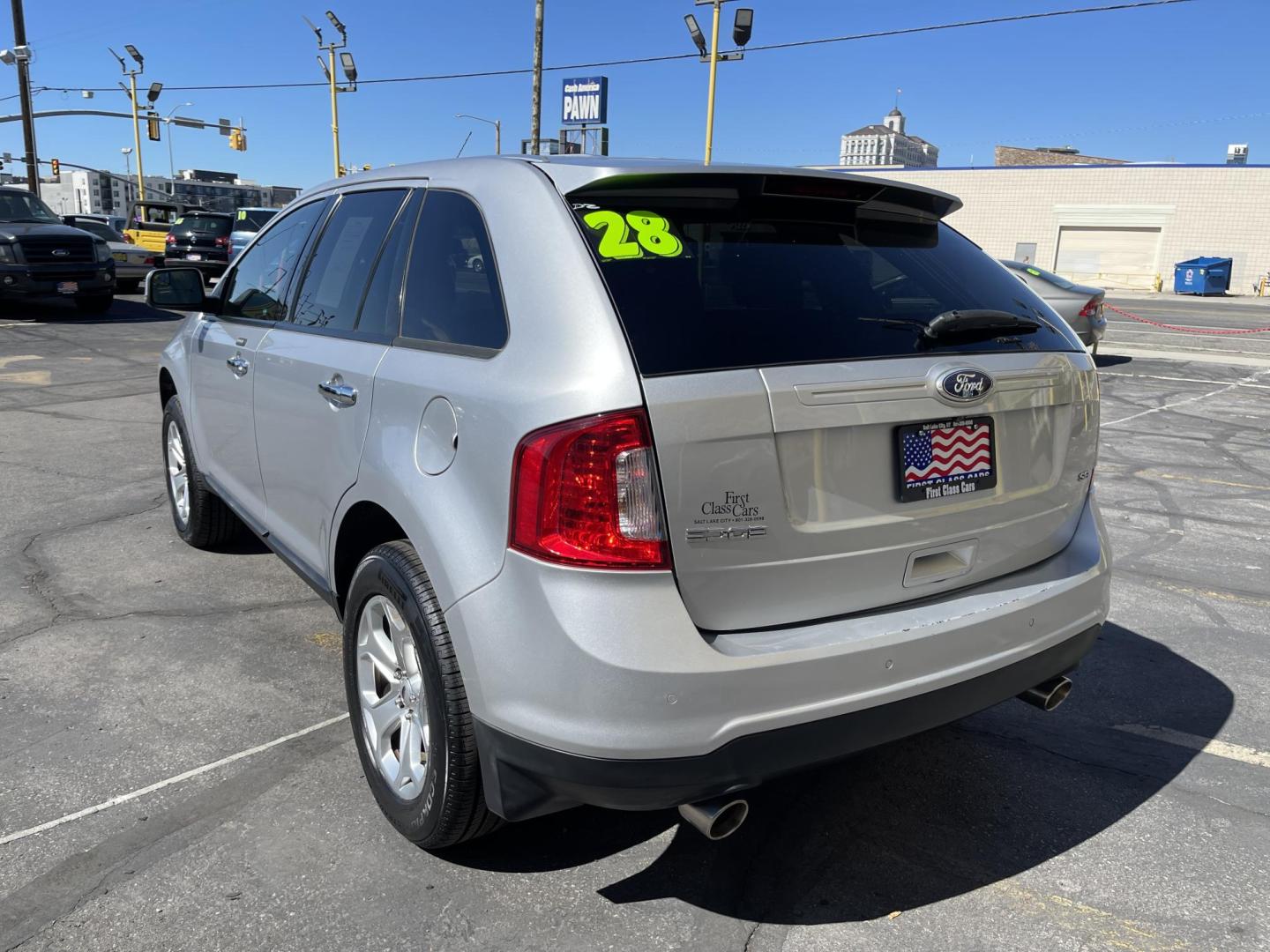 2011 Satin Silver Metallic /Black Ford Edge SEL FWD (2FMDK3JC2BB) with an 3.5L V6 DOHC 24V engine, 6-Speed Automatic transmission, located at 801 South State Street, Salt Lake City, UT, 84111, (801) 328-0098, 40.751953, -111.888206 - Clean Carfax no reported accidents on Carfax! Nice SUV! Features: Alloy Wheels, Parking Sensors, Bluetooth Technology, Satellite Radio Ready, Cloth Seats, SiriusXM Trial Available, ABS Brakes, Auxiliary Audio Input, Power Locks, Rear Defroster, AM/FM Stereo, CD Audio, Power Mirrors, Side Airbags, - Photo#10