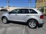 2011 Satin Silver Metallic /Black Ford Edge SEL FWD (2FMDK3JC2BB) with an 3.5L V6 DOHC 24V engine, 6-Speed Automatic transmission, located at 801 South State Street, Salt Lake City, UT, 84111, (801) 328-0098, 40.751953, -111.888206 - Clean Carfax no reported accidents on Carfax! Nice SUV! Features: Alloy Wheels, Parking Sensors, Bluetooth Technology, Satellite Radio Ready, Cloth Seats, SiriusXM Trial Available, ABS Brakes, Auxiliary Audio Input, Power Locks, Rear Defroster, AM/FM Stereo, CD Audio, Power Mirrors, Side Airbags, - Photo#11