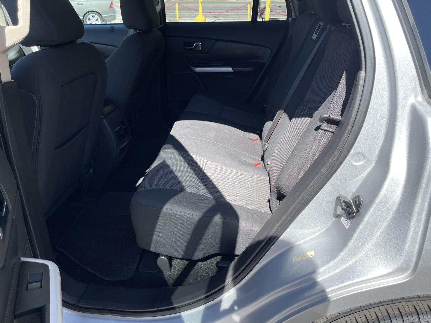 2011 Satin Silver Metallic /Black Ford Edge SEL FWD (2FMDK3JC2BB) with an 3.5L V6 DOHC 24V engine, 6-Speed Automatic transmission, located at 801 South State Street, Salt Lake City, UT, 84111, (801) 328-0098, 40.751953, -111.888206 - Clean Carfax no reported accidents on Carfax! Nice SUV! Features: Alloy Wheels, Parking Sensors, Bluetooth Technology, Satellite Radio Ready, Cloth Seats, SiriusXM Trial Available, ABS Brakes, Auxiliary Audio Input, Power Locks, Rear Defroster, AM/FM Stereo, CD Audio, Power Mirrors, Side Airbags, - Photo#15