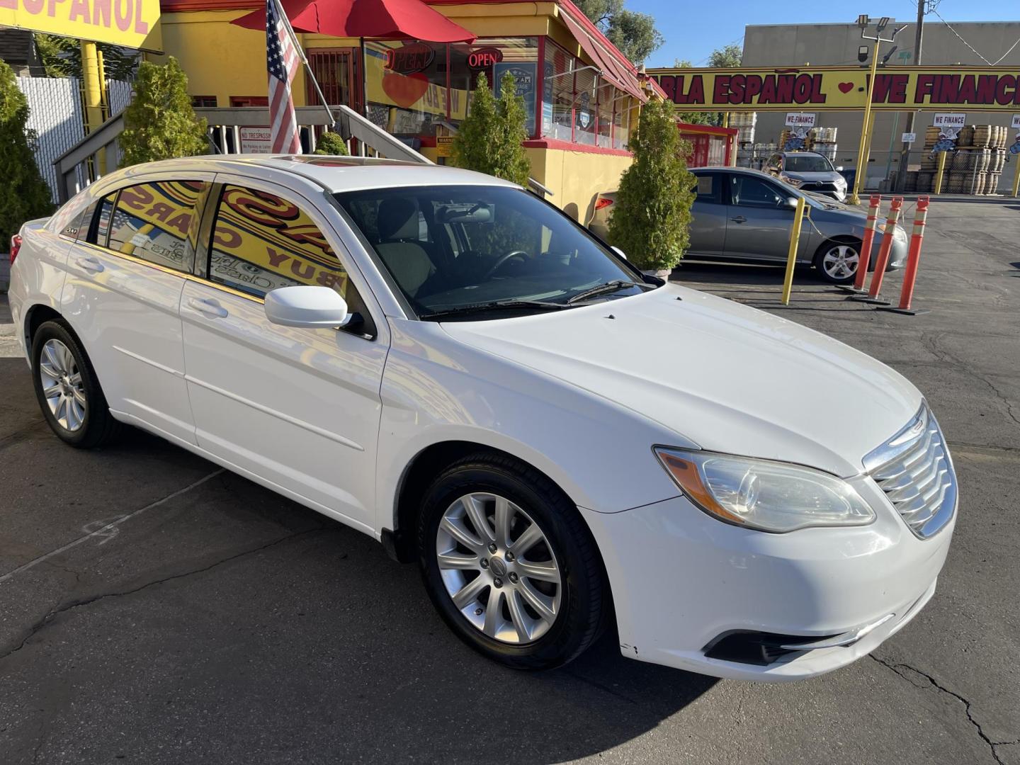 2013 Galaxy White /Black Chrysler 200 Touring (1C3CCBBG1DN) with an 3.6L V6 DOHC 24V FFV engine, 6-Speed Automatic transmission, located at 801 South State Street, Salt Lake City, UT, 84111, (801) 328-0098, 40.751953, -111.888206 - Clean title! No reported accidents on Carfax! Features: Alloy Wheels, Cloth Seats, Satellite Radio Ready, ABS Brakes, Auxiliary Audio Input, Power Locks, Rear Defroster, AM/FM Stereo, CD Audio, Power Mirrors, Side Airbags, Air Conditioning, Cruise Control, Power Seat(s), Traction Control, Automati - Photo#4