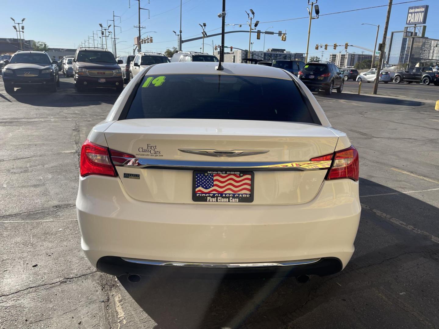 2013 Galaxy White /Black Chrysler 200 Touring (1C3CCBBG1DN) with an 3.6L V6 DOHC 24V FFV engine, 6-Speed Automatic transmission, located at 801 South State Street, Salt Lake City, UT, 84111, (801) 328-0098, 40.751953, -111.888206 - Clean title! No reported accidents on Carfax! Features: Alloy Wheels, Cloth Seats, Satellite Radio Ready, ABS Brakes, Auxiliary Audio Input, Power Locks, Rear Defroster, AM/FM Stereo, CD Audio, Power Mirrors, Side Airbags, Air Conditioning, Cruise Control, Power Seat(s), Traction Control, Automati - Photo#7