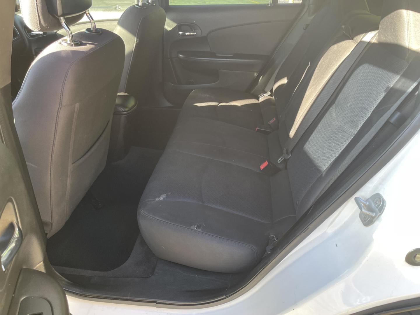 2013 Galaxy White /Black Chrysler 200 Touring (1C3CCBBG1DN) with an 3.6L V6 DOHC 24V FFV engine, 6-Speed Automatic transmission, located at 801 South State Street, Salt Lake City, UT, 84111, (801) 328-0098, 40.751953, -111.888206 - Clean title! No reported accidents on Carfax! Features: Alloy Wheels, Cloth Seats, Satellite Radio Ready, ABS Brakes, Auxiliary Audio Input, Power Locks, Rear Defroster, AM/FM Stereo, CD Audio, Power Mirrors, Side Airbags, Air Conditioning, Cruise Control, Power Seat(s), Traction Control, Automati - Photo#13
