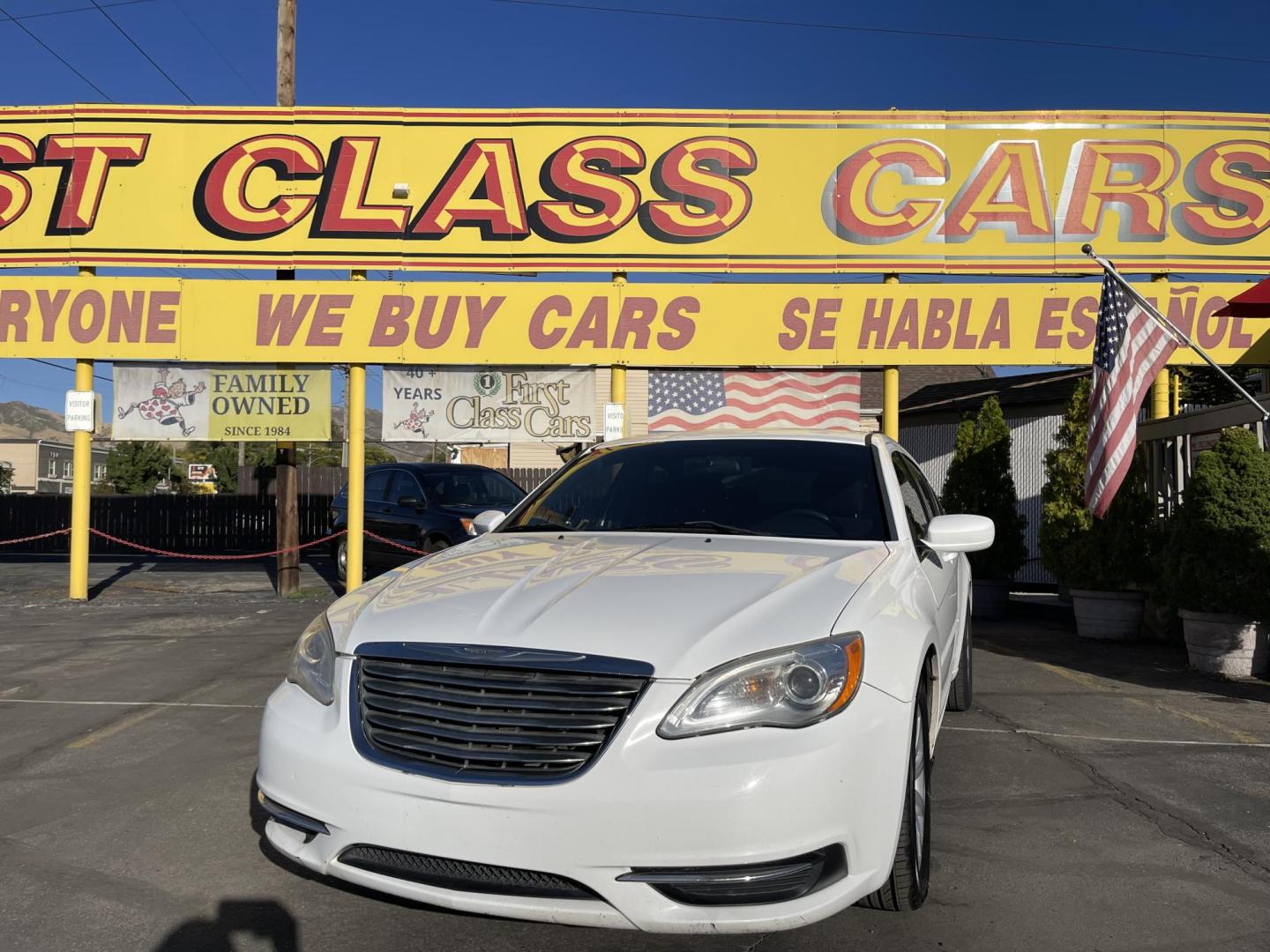2013 Galaxy White /Black Chrysler 200 Touring (1C3CCBBG1DN) with an 3.6L V6 DOHC 24V FFV engine, 6-Speed Automatic transmission, located at 801 South State Street, Salt Lake City, UT, 84111, (801) 328-0098, 40.751953, -111.888206 - Clean title! No reported accidents on Carfax! Features: Alloy Wheels, Cloth Seats, Satellite Radio Ready, ABS Brakes, Auxiliary Audio Input, Power Locks, Rear Defroster, AM/FM Stereo, CD Audio, Power Mirrors, Side Airbags, Air Conditioning, Cruise Control, Power Seat(s), Traction Control, Automati - Photo#1