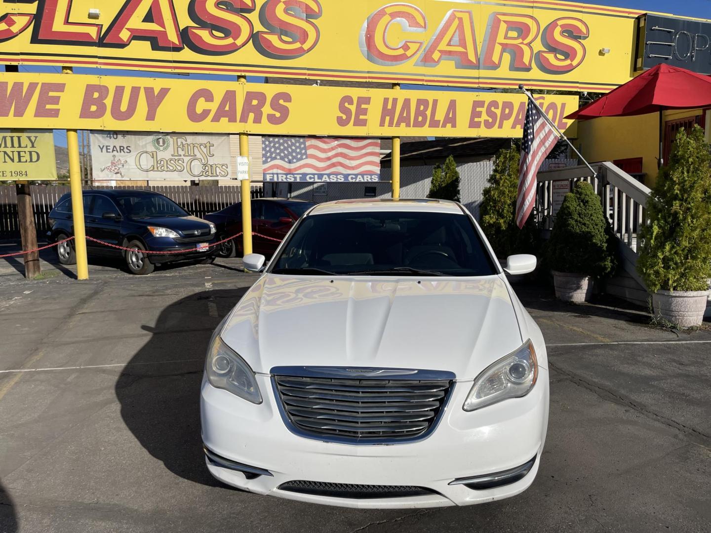 2013 Galaxy White /Black Chrysler 200 Touring (1C3CCBBG1DN) with an 3.6L V6 DOHC 24V FFV engine, 6-Speed Automatic transmission, located at 801 South State Street, Salt Lake City, UT, 84111, (801) 328-0098, 40.751953, -111.888206 - Clean title! No reported accidents on Carfax! Features: Alloy Wheels, Cloth Seats, Satellite Radio Ready, ABS Brakes, Auxiliary Audio Input, Power Locks, Rear Defroster, AM/FM Stereo, CD Audio, Power Mirrors, Side Airbags, Air Conditioning, Cruise Control, Power Seat(s), Traction Control, Automati - Photo#2