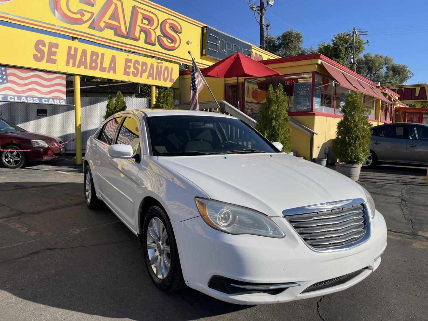 2013 Galaxy White /Black Chrysler 200 Touring (1C3CCBBG1DN) with an 3.6L V6 DOHC 24V FFV engine, 6-Speed Automatic transmission, located at 801 South State Street, Salt Lake City, UT, 84111, (801) 328-0098, 40.751953, -111.888206 - Clean title! No reported accidents on Carfax! Features: Alloy Wheels, Cloth Seats, Satellite Radio Ready, ABS Brakes, Auxiliary Audio Input, Power Locks, Rear Defroster, AM/FM Stereo, CD Audio, Power Mirrors, Side Airbags, Air Conditioning, Cruise Control, Power Seat(s), Traction Control, Automati - Photo#3