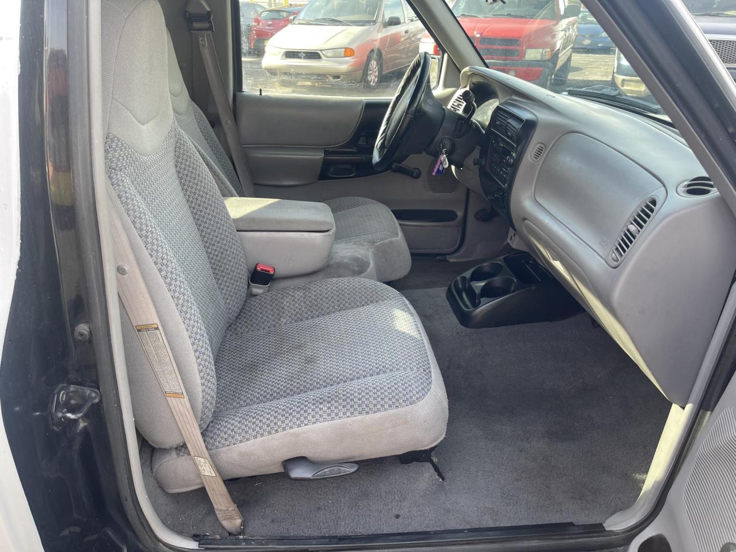 1999 Artic White /Gray Ford Ranger XL Reg. Cab Long Bed (1FTYR10V4XP) with an 3.0L V6 OHV 12V FFV engine, Automatic transmission, located at 801 South State Street, Salt Lake City, UT, 84111, (801) 328-0098, 40.751953, -111.888206 - Hard to find small fuel efficient truck! In great running condition for the year, make and miles! New bed liner has been sprayed in the bed! Clean truck in good running condition! Perfect for anyone looking to run a small business and need a truck for multiple needs. Features: 4 cylinder 3.0 liter - Photo#15