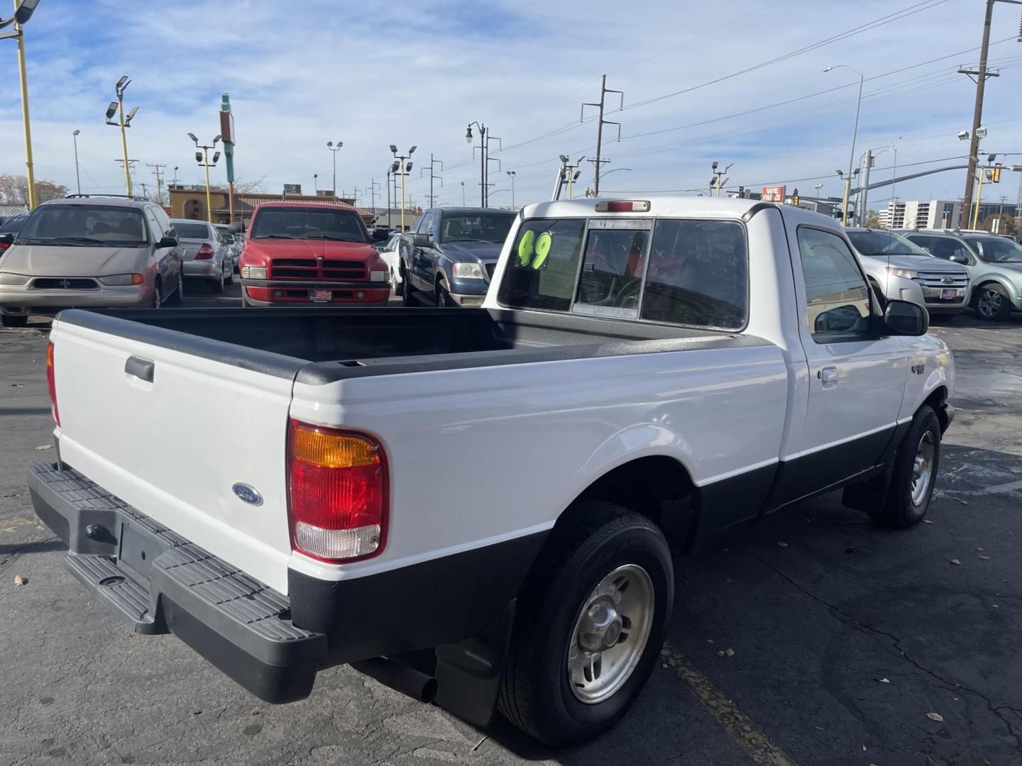 1999 Artic White /Gray Ford Ranger XL Reg. Cab Long Bed (1FTYR10V4XP) with an 3.0L V6 OHV 12V FFV engine, Automatic transmission, located at 801 South State Street, Salt Lake City, UT, 84111, (801) 328-0098, 40.751953, -111.888206 - Hard to find small fuel efficient truck! In great running condition for the year, make and miles! New bed liner has been sprayed in the bed! Clean truck in good running condition! Perfect for anyone looking to run a small business and need a truck for multiple needs. Features: 4 cylinder 3.0 liter - Photo#7