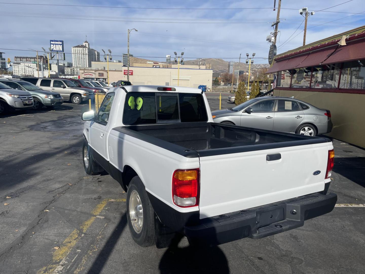 1999 Artic White /Gray Ford Ranger XL Reg. Cab Long Bed (1FTYR10V4XP) with an 3.0L V6 OHV 12V FFV engine, Automatic transmission, located at 801 South State Street, Salt Lake City, UT, 84111, (801) 328-0098, 40.751953, -111.888206 - Hard to find small fuel efficient truck! In great running condition for the year, make and miles! New bed liner has been sprayed in the bed! Clean truck in good running condition! Perfect for anyone looking to run a small business and need a truck for multiple needs. Features: 4 cylinder 3.0 liter - Photo#9