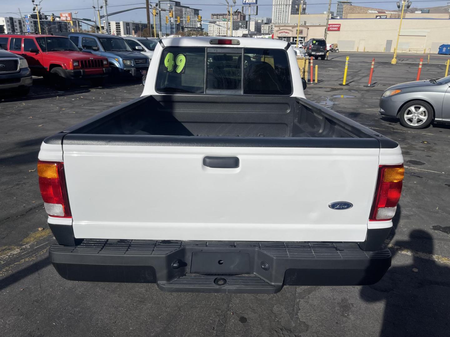 1999 Artic White /Gray Ford Ranger XL Reg. Cab Long Bed (1FTYR10V4XP) with an 3.0L V6 OHV 12V FFV engine, Automatic transmission, located at 801 South State Street, Salt Lake City, UT, 84111, (801) 328-0098, 40.751953, -111.888206 - Hard to find small fuel efficient truck! In great running condition for the year, make and miles! New bed liner has been sprayed in the bed! Clean truck in good running condition! Perfect for anyone looking to run a small business and need a truck for multiple needs. Features: 4 cylinder 3.0 liter - Photo#8