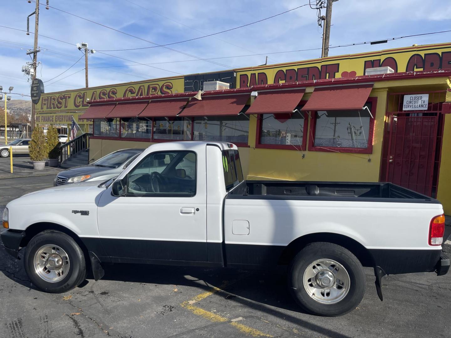 1999 Artic White /Gray Ford Ranger XL Reg. Cab Long Bed (1FTYR10V4XP) with an 3.0L V6 OHV 12V FFV engine, Automatic transmission, located at 801 South State Street, Salt Lake City, UT, 84111, (801) 328-0098, 40.751953, -111.888206 - Hard to find small fuel efficient truck! In great running condition for the year, make and miles! New bed liner has been sprayed in the bed! Clean truck in good running condition! Perfect for anyone looking to run a small business and need a truck for multiple needs. Features: 4 cylinder 3.0 liter - Photo#10