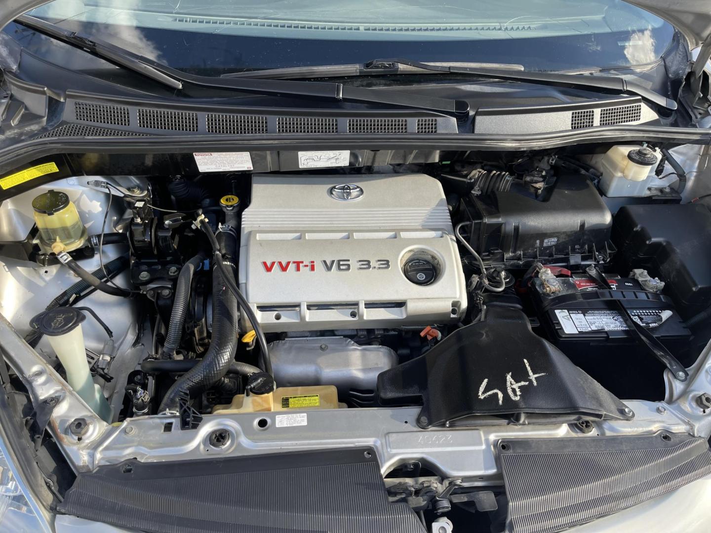 2006 Silver Sky Metallic /Gray Toyota Sienna CE 7-Passenger Seating (5TDZA23CX6S) with an 3.3L V6 DOHC 24V engine, 5-Speed Automatic Overdrive transmission, located at 801 South State Street, Salt Lake City, UT, 84111, (801) 328-0098, 40.751953, -111.888206 - Great affordable family van! 7 passenger seating with 3rd row seating! Good condition for the year, make and miles! *Branded Title* *Rebuilt/Restored* Features Top Features: Cloth Seats, Rear Air Conditioning, Fold-Away Third Row, Third Row Seat, Quad Seats, ABS Brakes, Auxiliary Audio Input, Ove - Photo#18