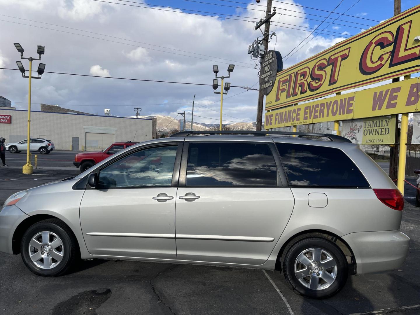 2006 Silver Sky Metallic /Gray Toyota Sienna CE 7-Passenger Seating (5TDZA23CX6S) with an 3.3L V6 DOHC 24V engine, 5-Speed Automatic Overdrive transmission, located at 801 South State Street, Salt Lake City, UT, 84111, (801) 328-0098, 40.751953, -111.888206 - Great affordable family van! 7 passenger seating with 3rd row seating! Good condition for the year, make and miles! *Branded Title* *Rebuilt/Restored* Features Top Features: Cloth Seats, Rear Air Conditioning, Fold-Away Third Row, Third Row Seat, Quad Seats, ABS Brakes, Auxiliary Audio Input, Ove - Photo#6