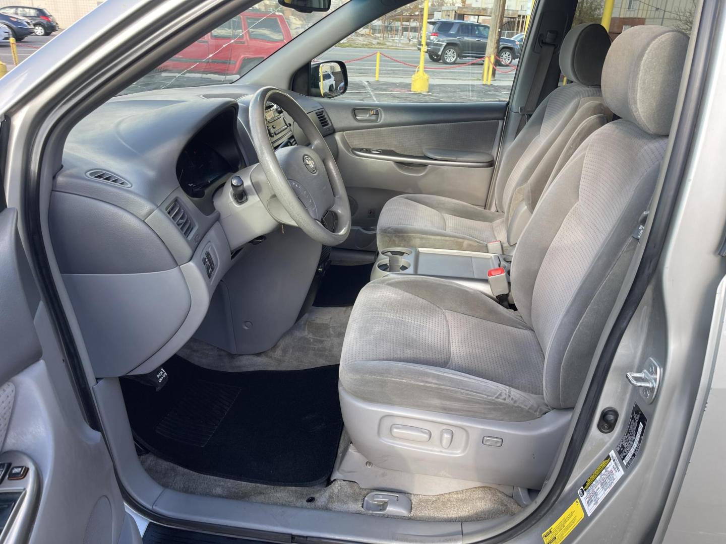 2006 Silver Sky Metallic /Gray Toyota Sienna CE 7-Passenger Seating (5TDZA23CX6S) with an 3.3L V6 DOHC 24V engine, 5-Speed Automatic Overdrive transmission, located at 801 South State Street, Salt Lake City, UT, 84111, (801) 328-0098, 40.751953, -111.888206 - Great affordable family van! 7 passenger seating with 3rd row seating! Good condition for the year, make and miles! *Branded Title* *Rebuilt/Restored* Features Top Features: Cloth Seats, Rear Air Conditioning, Fold-Away Third Row, Third Row Seat, Quad Seats, ABS Brakes, Auxiliary Audio Input, Ove - Photo#8