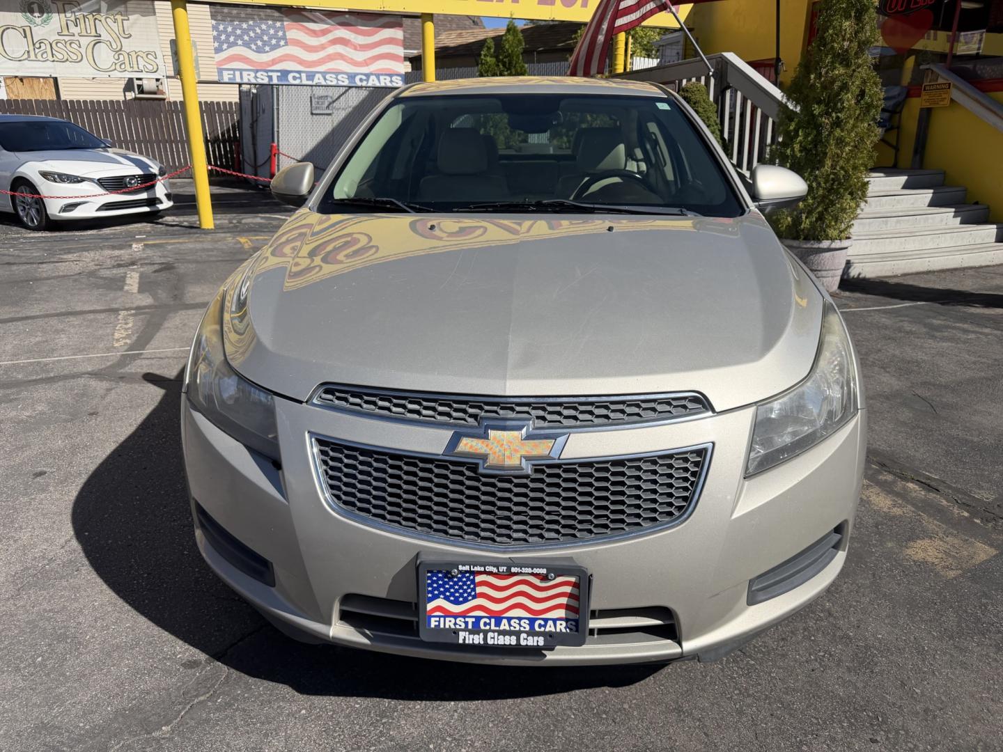 2013 Harvest Gold Metallic /Tan Chevrolet Cruze 2LT Auto (1G1PE5SB7D7) with an 1.4L L4 DOHC 16V TURBO engine, 6-Speed Automatic transmission, located at 801 South State Street, Salt Lake City, UT, 84111, (801) 328-0098, 40.751953, -111.888206 - Clean title! No reported accidents on Carfax! In great condition for the year make and miles. Low miles hard to find!!! Features: Leather Seats, Heated Seats, Alloy Wheels, Satellite Radio Ready, Bluetooth Technology, Turbo Charged Engine, Cloth Seats, ABS Brakes, Auxiliary Audio Input, Power Lock- Photo#2