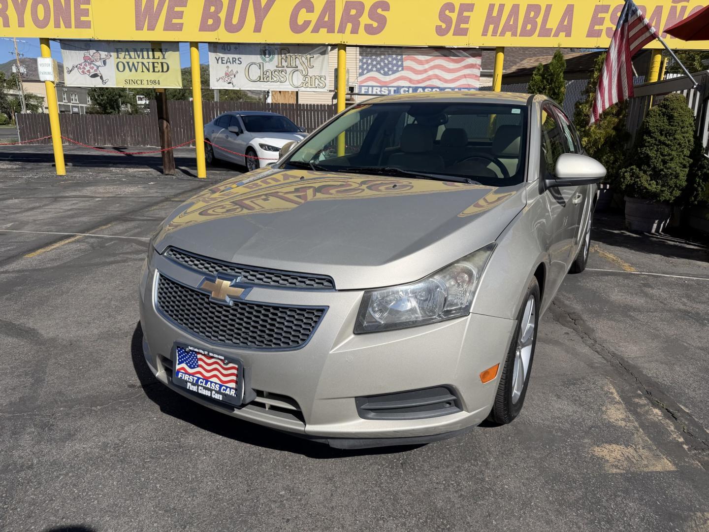 2013 Harvest Gold Metallic /Tan Chevrolet Cruze 2LT Auto (1G1PE5SB7D7) with an 1.4L L4 DOHC 16V TURBO engine, 6-Speed Automatic transmission, located at 801 South State Street, Salt Lake City, UT, 84111, (801) 328-0098, 40.751953, -111.888206 - Clean title! No reported accidents on Carfax! In great condition for the year make and miles. Low miles hard to find!!! Features: Leather Seats, Heated Seats, Alloy Wheels, Satellite Radio Ready, Bluetooth Technology, Turbo Charged Engine, Cloth Seats, ABS Brakes, Auxiliary Audio Input, Power Lock- Photo#1