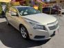 2013 Harvest Gold Metallic /Tan Chevrolet Cruze 2LT Auto (1G1PE5SB7D7) with an 1.4L L4 DOHC 16V TURBO engine, 6-Speed Automatic transmission, located at 801 South State Street, Salt Lake City, UT, 84111, (801) 328-0098, 40.751953, -111.888206 - Clean title! No reported accidents on Carfax! In great condition for the year make and miles. Low miles hard to find!!! Features: Leather Seats, Heated Seats, Alloy Wheels, Satellite Radio Ready, Bluetooth Technology, Turbo Charged Engine, Cloth Seats, ABS Brakes, Auxiliary Audio Input, Power Lock- Photo#3