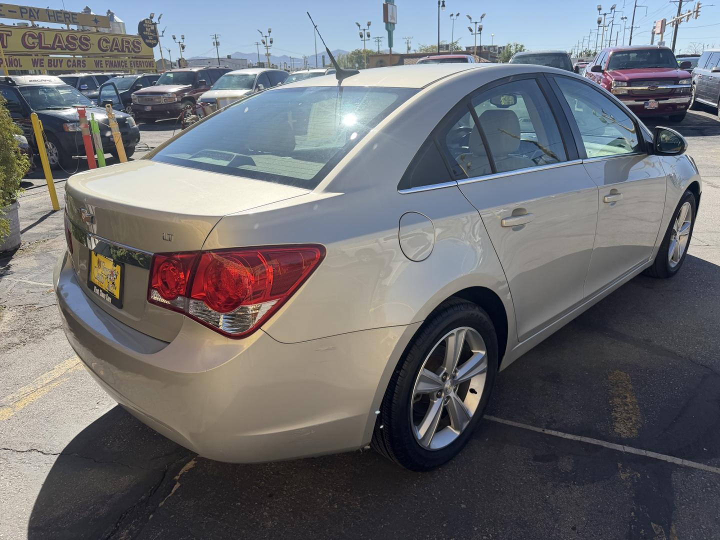 2013 Harvest Gold Metallic /Tan Chevrolet Cruze 2LT Auto (1G1PE5SB7D7) with an 1.4L L4 DOHC 16V TURBO engine, 6-Speed Automatic transmission, located at 801 South State Street, Salt Lake City, UT, 84111, (801) 328-0098, 40.751953, -111.888206 - Clean title! No reported accidents on Carfax! In great condition for the year make and miles. Low miles hard to find!!! Features: Leather Seats, Heated Seats, Alloy Wheels, Satellite Radio Ready, Bluetooth Technology, Turbo Charged Engine, Cloth Seats, ABS Brakes, Auxiliary Audio Input, Power Lock- Photo#5