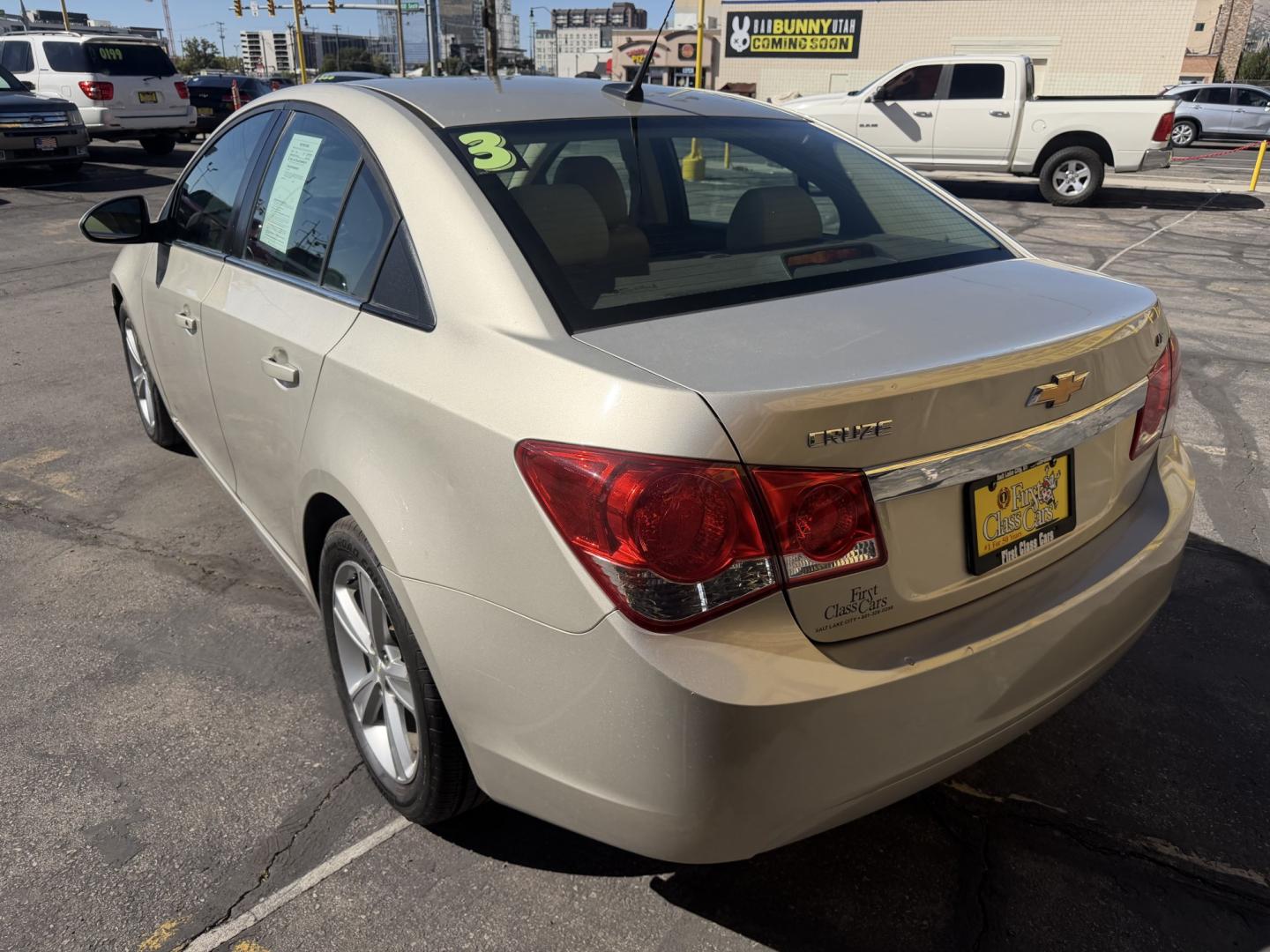 2013 Harvest Gold Metallic /Tan Chevrolet Cruze 2LT Auto (1G1PE5SB7D7) with an 1.4L L4 DOHC 16V TURBO engine, 6-Speed Automatic transmission, located at 801 South State Street, Salt Lake City, UT, 84111, (801) 328-0098, 40.751953, -111.888206 - Clean title! No reported accidents on Carfax! In great condition for the year make and miles. Low miles hard to find!!! Features: Leather Seats, Heated Seats, Alloy Wheels, Satellite Radio Ready, Bluetooth Technology, Turbo Charged Engine, Cloth Seats, ABS Brakes, Auxiliary Audio Input, Power Lock- Photo#7