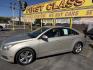 2013 Harvest Gold Metallic /Tan Chevrolet Cruze 2LT Auto (1G1PE5SB7D7) with an 1.4L L4 DOHC 16V TURBO engine, 6-Speed Automatic transmission, located at 801 South State Street, Salt Lake City, UT, 84111, (801) 328-0098, 40.751953, -111.888206 - Clean title! No reported accidents on Carfax! In great condition for the year make and miles. Low miles hard to find!!! Features: Leather Seats, Heated Seats, Alloy Wheels, Satellite Radio Ready, Bluetooth Technology, Turbo Charged Engine, Cloth Seats, ABS Brakes, Auxiliary Audio Input, Power Lock- Photo#9