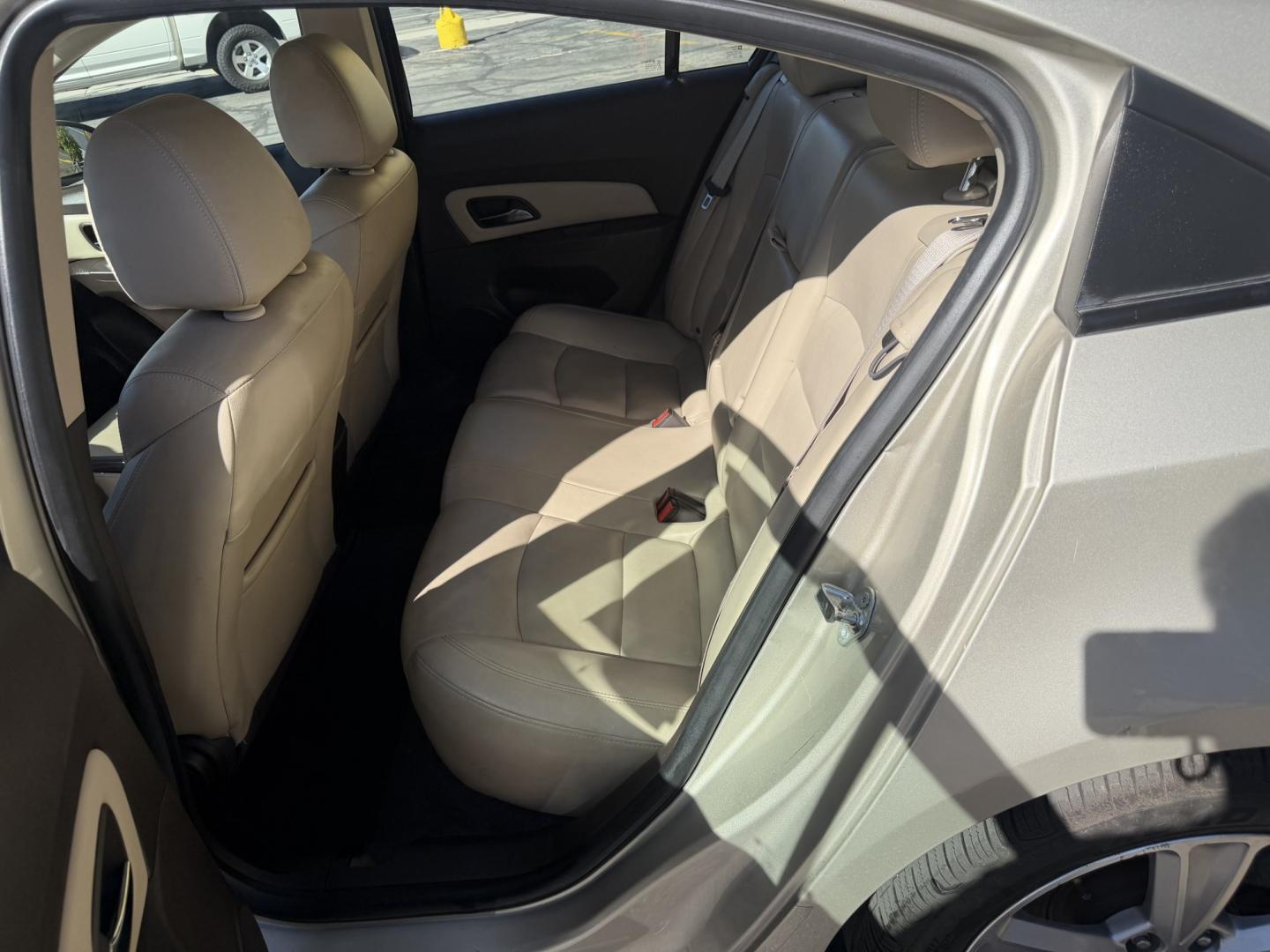 2013 Harvest Gold Metallic /Tan Chevrolet Cruze 2LT Auto (1G1PE5SB7D7) with an 1.4L L4 DOHC 16V TURBO engine, 6-Speed Automatic transmission, located at 801 South State Street, Salt Lake City, UT, 84111, (801) 328-0098, 40.751953, -111.888206 - Clean title! No reported accidents on Carfax! In great condition for the year make and miles. Low miles hard to find!!! Features: Leather Seats, Heated Seats, Alloy Wheels, Satellite Radio Ready, Bluetooth Technology, Turbo Charged Engine, Cloth Seats, ABS Brakes, Auxiliary Audio Input, Power Lock- Photo#12