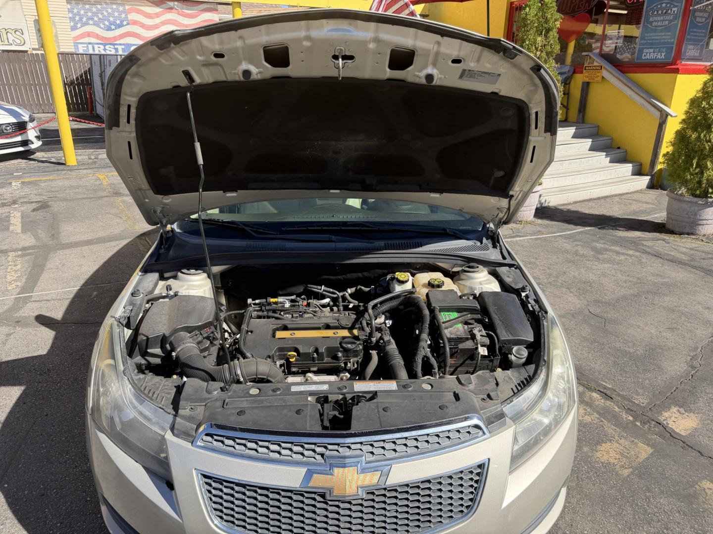 2013 Harvest Gold Metallic /Tan Chevrolet Cruze 2LT Auto (1G1PE5SB7D7) with an 1.4L L4 DOHC 16V TURBO engine, 6-Speed Automatic transmission, located at 801 South State Street, Salt Lake City, UT, 84111, (801) 328-0098, 40.751953, -111.888206 - Clean title! No reported accidents on Carfax! In great condition for the year make and miles. Low miles hard to find!!! Features: Leather Seats, Heated Seats, Alloy Wheels, Satellite Radio Ready, Bluetooth Technology, Turbo Charged Engine, Cloth Seats, ABS Brakes, Auxiliary Audio Input, Power Lock- Photo#20