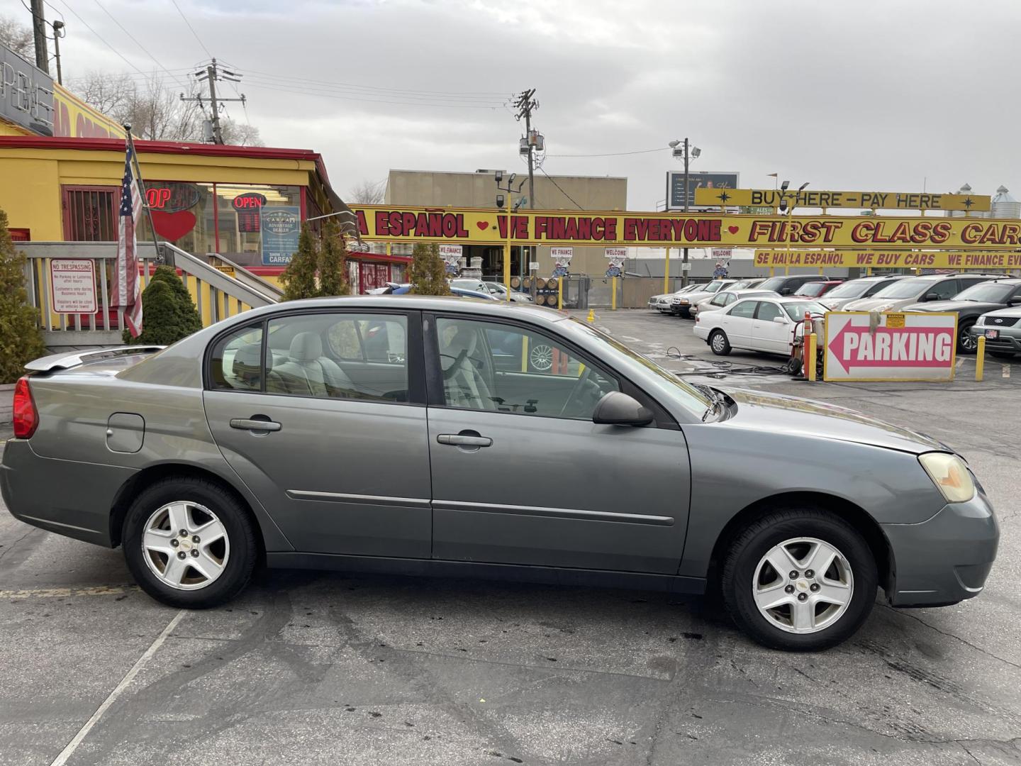 2005 Ingot Silver Metallic /Gray Chevrolet Malibu LS (1G1ZT52805F) with an 3.5L V6 OHV 12V engine, 4-Speed Automatic Overdrive transmission, located at 801 South State Street, Salt Lake City, UT, 84111, (801) 328-0098, 40.751953, -111.888206 - Clean title good reliable commuter vehicle for anyone looking for reliable transportation to go to and from work. Vehicle has passed emissions and ready to license. Features: 3.5 Liter V6 engine, Front wheel drive, automatic, power locks, power windows, cloth seats, am/fm/cd radio, power mirrors, - Photo#5