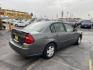 2005 Ingot Silver Metallic /Gray Chevrolet Malibu LS (1G1ZT52805F) with an 3.5L V6 OHV 12V engine, 4-Speed Automatic Overdrive transmission, located at 801 South State Street, Salt Lake City, UT, 84111, (801) 328-0098, 40.751953, -111.888206 - Clean title good reliable commuter vehicle for anyone looking for reliable transportation to go to and from work. Vehicle has passed emissions and ready to license. Features: 3.5 Liter V6 engine, Front wheel drive, automatic, power locks, power windows, cloth seats, am/fm/cd radio, power mirrors, - Photo#6