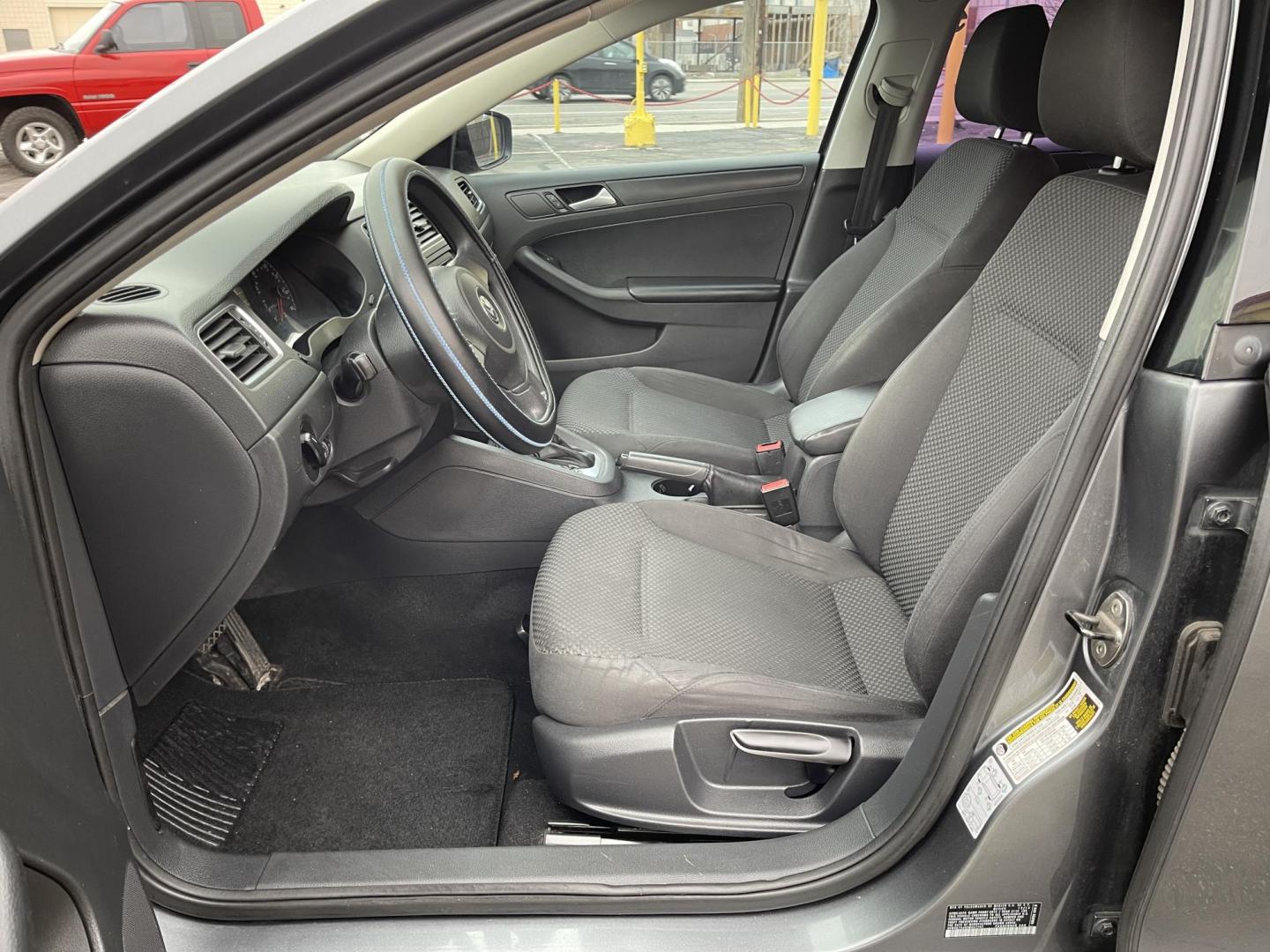 2014 Metropolitan Gray Metallic /BLACK Volkswagen Jetta S (3VW2K7AJXEM) with an 2.0L L4 DOHC 20V engine, Automatic transmission, located at 801 South State Street, Salt Lake City, UT, 84111, (801) 328-0098, 40.751953, -111.888206 - Super clean 2014 Volkswagen Jetta S Clean title! Only 2 reported owners on the Carfax history report! Title guaranteed clean by Carfax. Hard to find this clean with low miles. Great Gas mileage. Volkswagen's are one of the best affordable commuter cars. Features: Automatic transmission, 100,534 mil - Photo#11