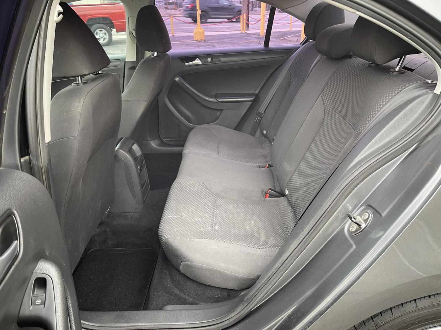 2014 Metropolitan Gray Metallic /BLACK Volkswagen Jetta S (3VW2K7AJXEM) with an 2.0L L4 DOHC 20V engine, Automatic transmission, located at 801 South State Street, Salt Lake City, UT, 84111, (801) 328-0098, 40.751953, -111.888206 - Super clean 2014 Volkswagen Jetta S Clean title! Only 2 reported owners on the Carfax history report! Title guaranteed clean by Carfax. Hard to find this clean with low miles. Great Gas mileage. Volkswagen's are one of the best affordable commuter cars. Features: Automatic transmission, 100,534 mil - Photo#12