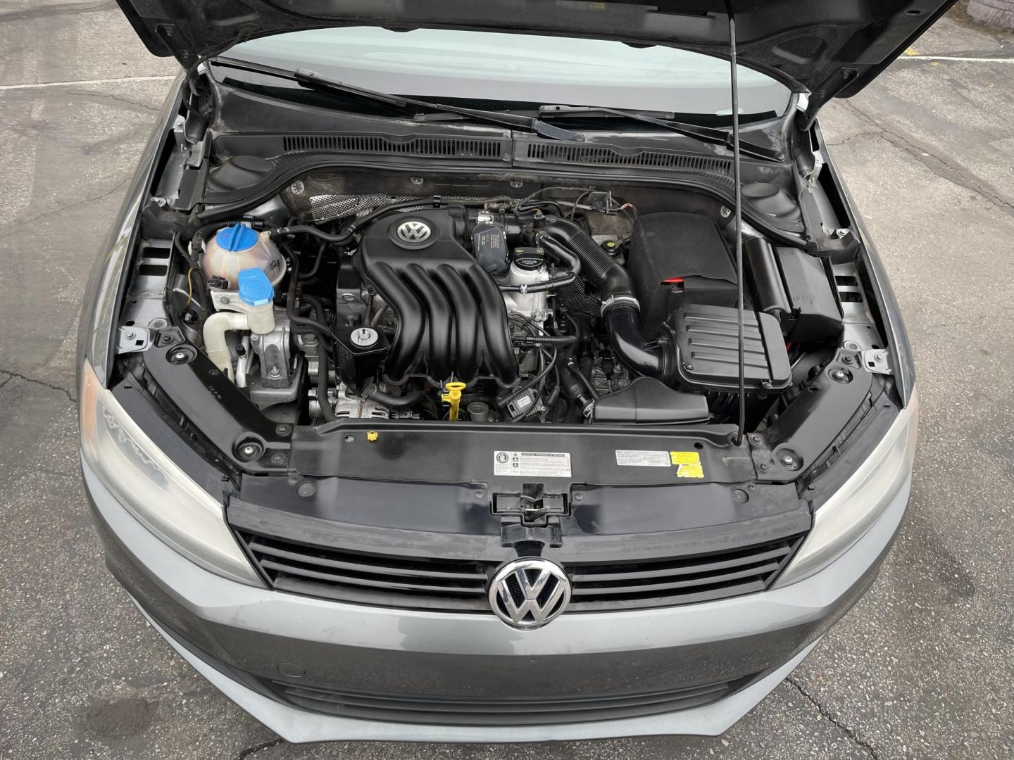 2014 Metropolitan Gray Metallic /BLACK Volkswagen Jetta S (3VW2K7AJXEM) with an 2.0L L4 DOHC 20V engine, Automatic transmission, located at 801 South State Street, Salt Lake City, UT, 84111, (801) 328-0098, 40.751953, -111.888206 - Super clean 2014 Volkswagen Jetta S Clean title! Only 2 reported owners on the Carfax history report! Title guaranteed clean by Carfax. Hard to find this clean with low miles. Great Gas mileage. Volkswagen's are one of the best affordable commuter cars. Features: Automatic transmission, 100,534 mil - Photo#21