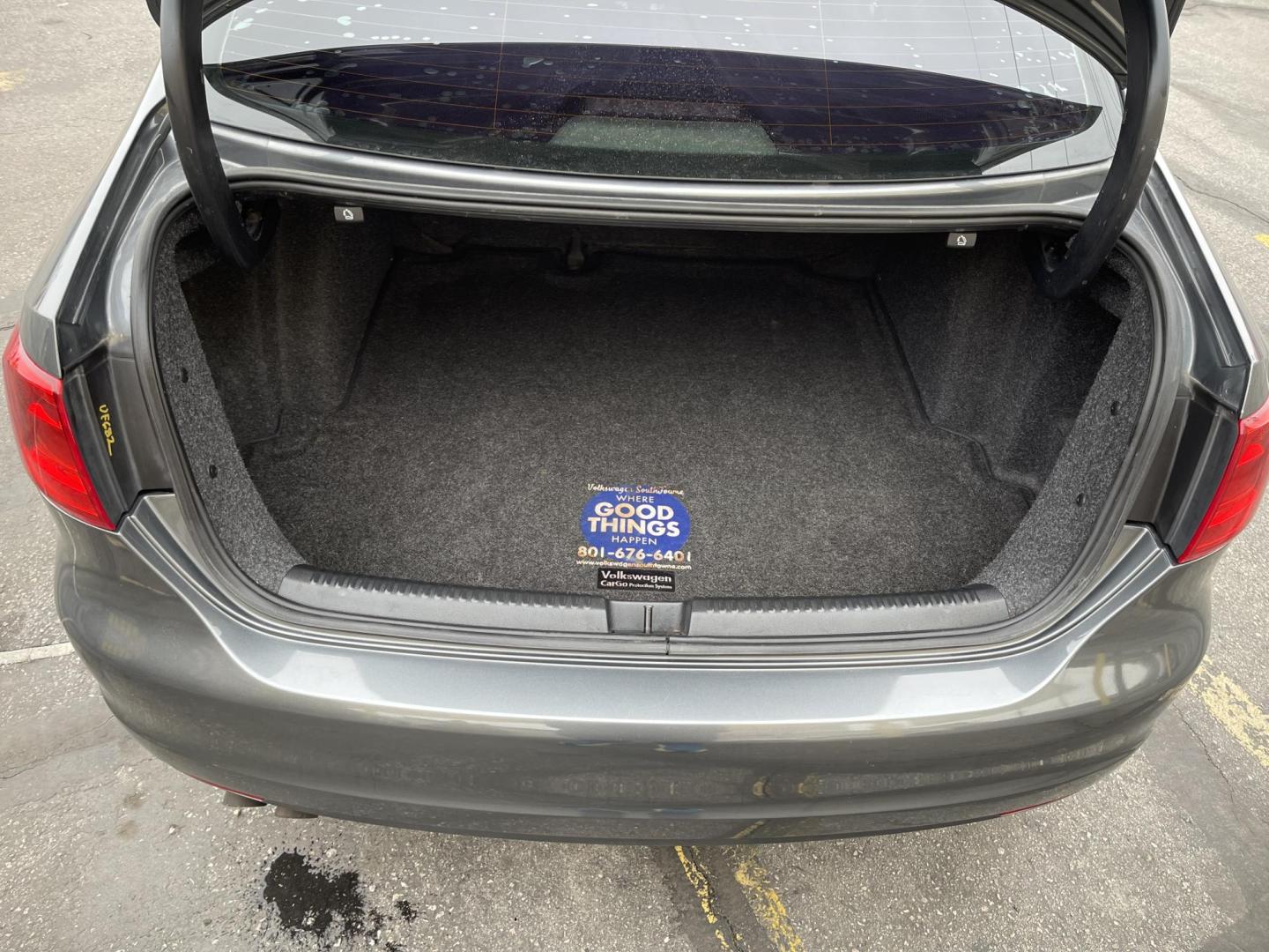 2014 Metropolitan Gray Metallic /BLACK Volkswagen Jetta S (3VW2K7AJXEM) with an 2.0L L4 DOHC 20V engine, Automatic transmission, located at 801 South State Street, Salt Lake City, UT, 84111, (801) 328-0098, 40.751953, -111.888206 - Super clean 2014 Volkswagen Jetta S Clean title! Only 2 reported owners on the Carfax history report! Title guaranteed clean by Carfax. Hard to find this clean with low miles. Great Gas mileage. Volkswagen's are one of the best affordable commuter cars. Features: Automatic transmission, 100,534 mil - Photo#24