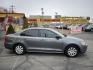 2014 Metropolitan Gray Metallic /BLACK Volkswagen Jetta S (3VW2K7AJXEM) with an 2.0L L4 DOHC 20V engine, Automatic transmission, located at 801 South State Street, Salt Lake City, UT, 84111, (801) 328-0098, 40.751953, -111.888206 - Super clean 2014 Volkswagen Jetta S Clean title! Only 2 reported owners on the Carfax history report! Title guaranteed clean by Carfax. Hard to find this clean with low miles. Great Gas mileage. Volkswagen's are one of the best affordable commuter cars. Features: Automatic transmission, 100,534 mil - Photo#4