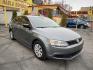 2014 Metropolitan Gray Metallic /BLACK Volkswagen Jetta S (3VW2K7AJXEM) with an 2.0L L4 DOHC 20V engine, Automatic transmission, located at 801 South State Street, Salt Lake City, UT, 84111, (801) 328-0098, 40.751953, -111.888206 - Super clean 2014 Volkswagen Jetta S Clean title! Only 2 reported owners on the Carfax history report! Title guaranteed clean by Carfax. Hard to find this clean with low miles. Great Gas mileage. Volkswagen's are one of the best affordable commuter cars. Features: Automatic transmission, 100,534 mil - Photo#3