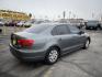 2014 Metropolitan Gray Metallic /BLACK Volkswagen Jetta S (3VW2K7AJXEM) with an 2.0L L4 DOHC 20V engine, Automatic transmission, located at 801 South State Street, Salt Lake City, UT, 84111, (801) 328-0098, 40.751953, -111.888206 - Super clean 2014 Volkswagen Jetta S Clean title! Only 2 reported owners on the Carfax history report! Title guaranteed clean by Carfax. Hard to find this clean with low miles. Great Gas mileage. Volkswagen's are one of the best affordable commuter cars. Features: Automatic transmission, 100,534 mil - Photo#5