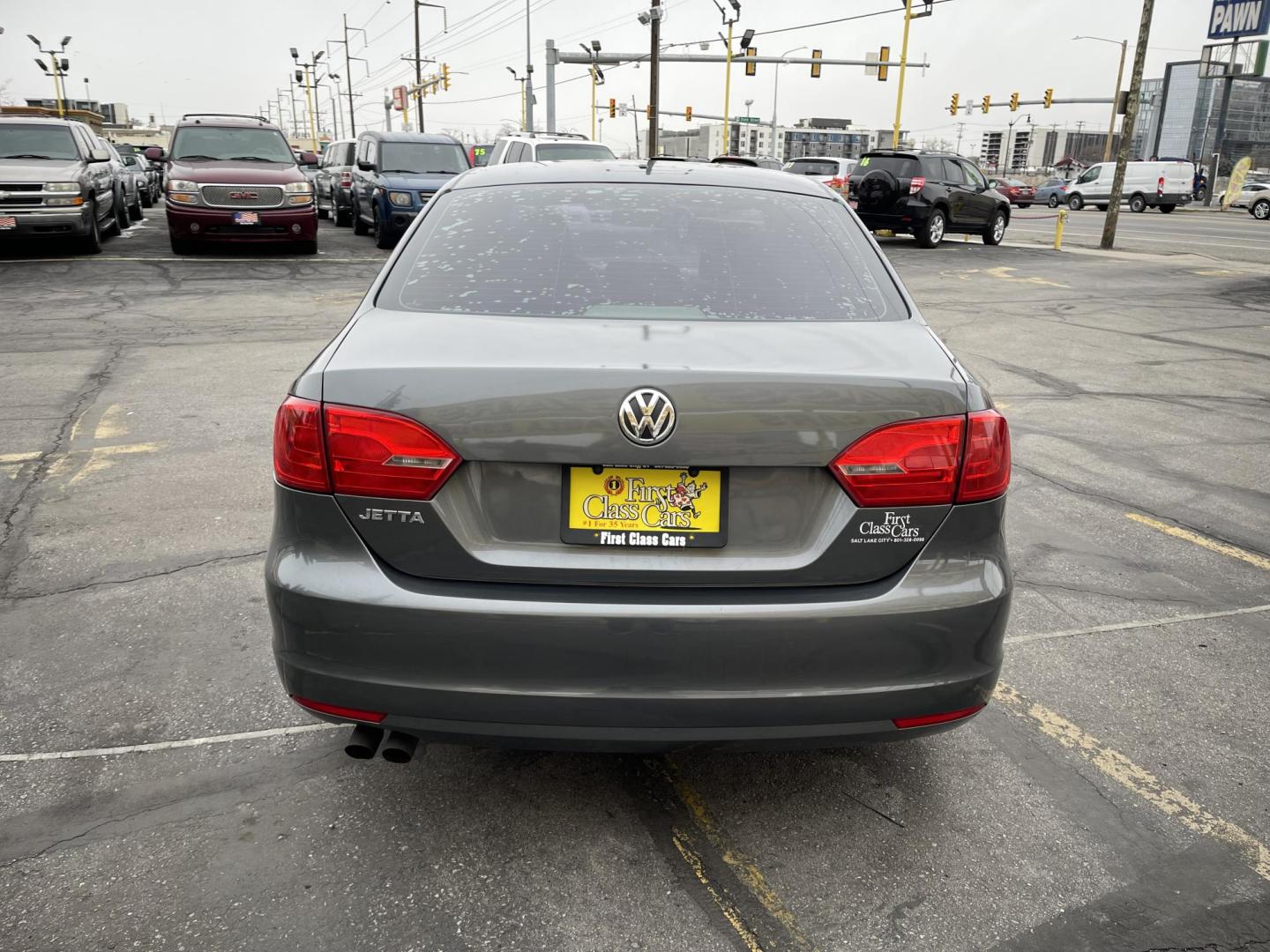 2014 Metropolitan Gray Metallic /BLACK Volkswagen Jetta S (3VW2K7AJXEM) with an 2.0L L4 DOHC 20V engine, Automatic transmission, located at 801 South State Street, Salt Lake City, UT, 84111, (801) 328-0098, 40.751953, -111.888206 - Super clean 2014 Volkswagen Jetta S Clean title! Only 2 reported owners on the Carfax history report! Title guaranteed clean by Carfax. Hard to find this clean with low miles. Great Gas mileage. Volkswagen's are one of the best affordable commuter cars. Features: Automatic transmission, 100,534 mil - Photo#7