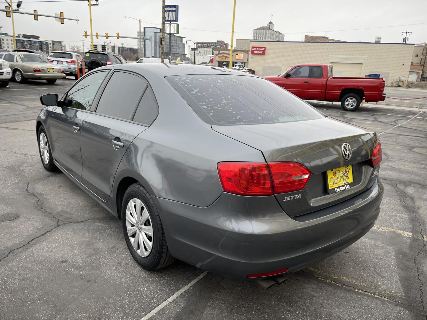 2014 Metropolitan Gray Metallic /BLACK Volkswagen Jetta S (3VW2K7AJXEM) with an 2.0L L4 DOHC 20V engine, Automatic transmission, located at 801 South State Street, Salt Lake City, UT, 84111, (801) 328-0098, 40.751953, -111.888206 - Super clean 2014 Volkswagen Jetta S Clean title! Only 2 reported owners on the Carfax history report! Title guaranteed clean by Carfax. Hard to find this clean with low miles. Great Gas mileage. Volkswagen's are one of the best affordable commuter cars. Features: Automatic transmission, 100,534 mil - Photo#8
